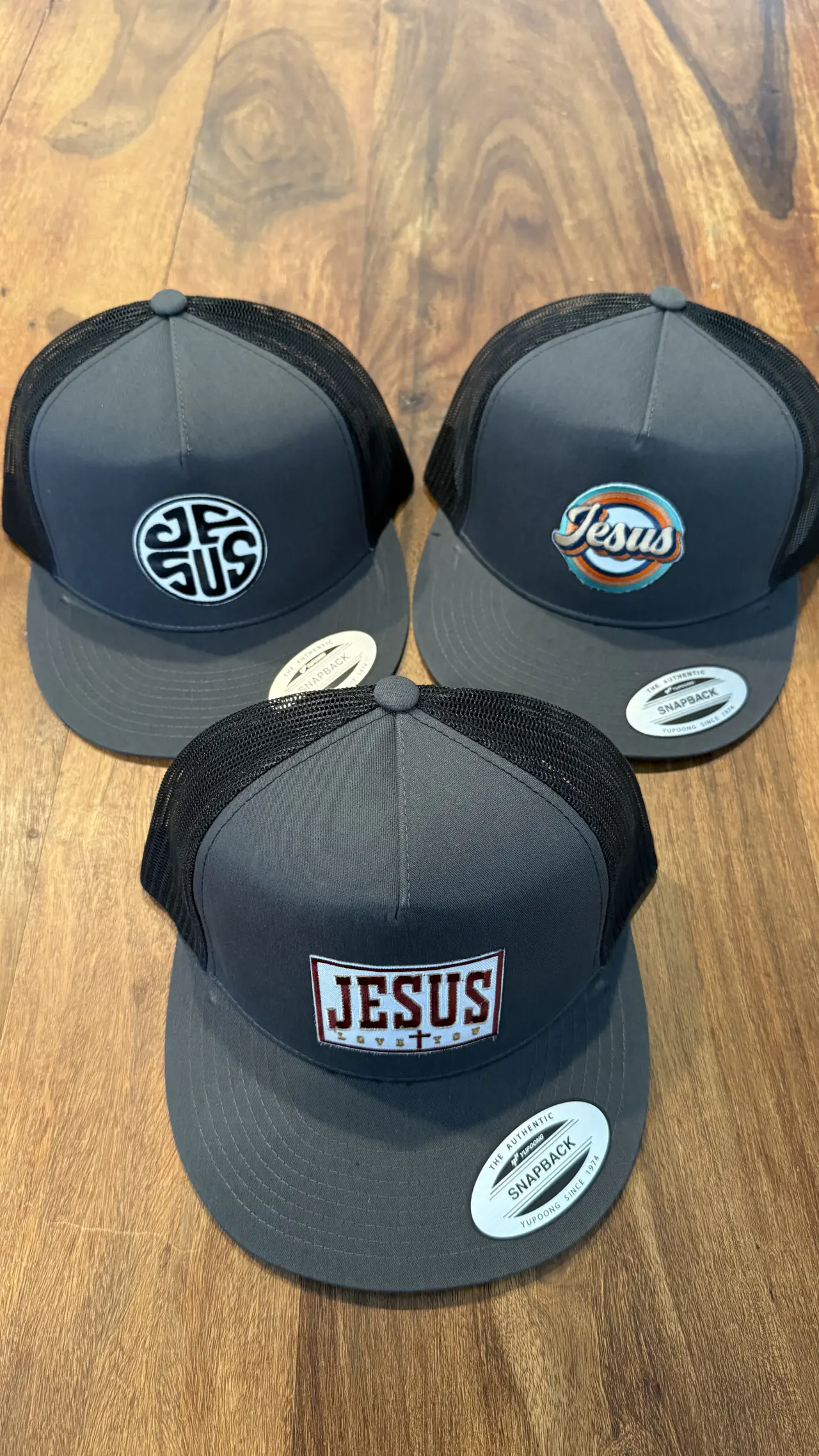 Jesus Collection flat-brim Christian trucker hat in Charcoal Gray